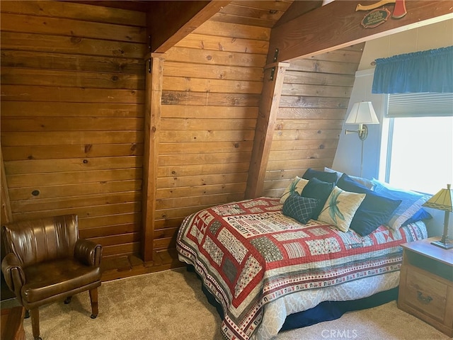 carpeted bedroom with wood walls