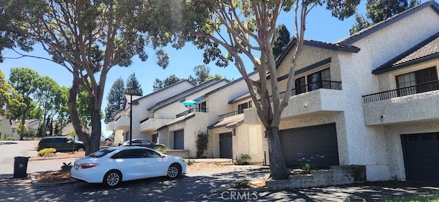 view of building exterior with a garage