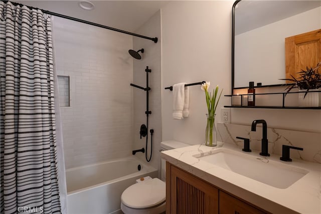 full bathroom with vanity, toilet, and shower / bath combo