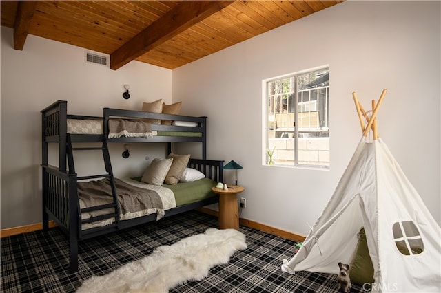 bedroom with beam ceiling and wooden ceiling