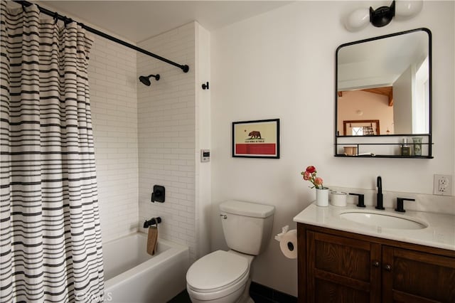 full bathroom featuring shower / bath combo with shower curtain, vanity, and toilet