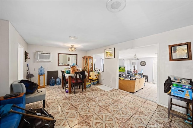 dining space featuring light tile patterned floors and a wall mounted AC