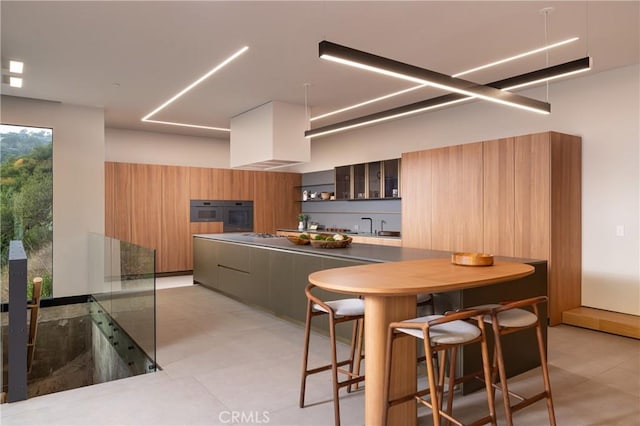 kitchen featuring a kitchen breakfast bar and oven