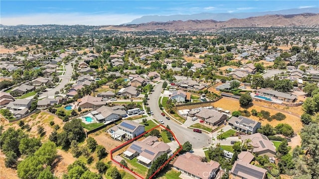 bird's eye view with a mountain view