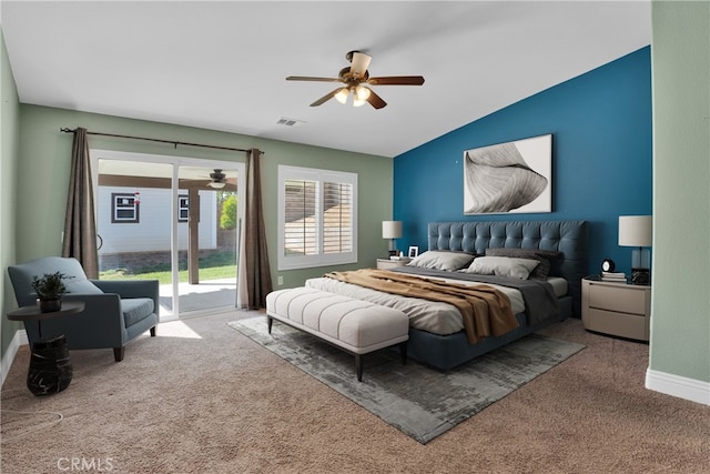 carpeted bedroom with access to outside, ceiling fan, and vaulted ceiling