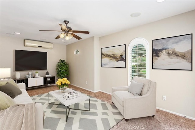 carpeted living area featuring recessed lighting, baseboards, ceiling fan, and a wall unit AC