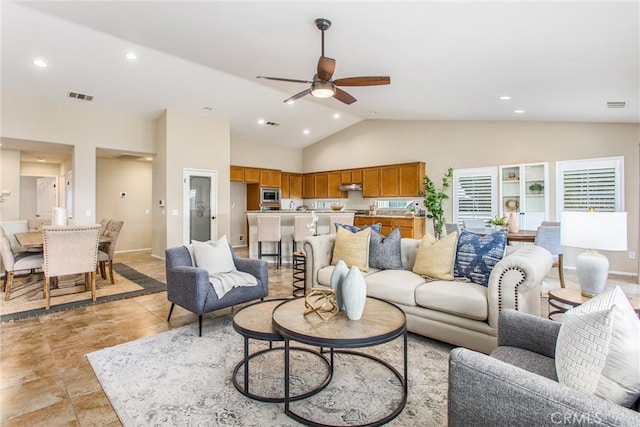 living room with recessed lighting, visible vents, lofted ceiling, and a ceiling fan