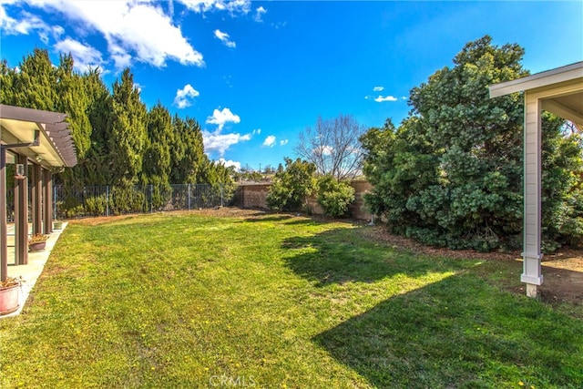 view of yard featuring a fenced backyard