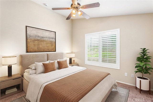 carpeted bedroom featuring a ceiling fan and baseboards