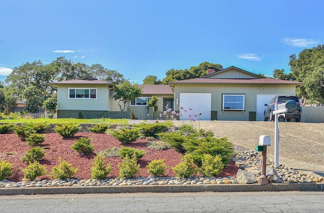 ranch-style home with a garage