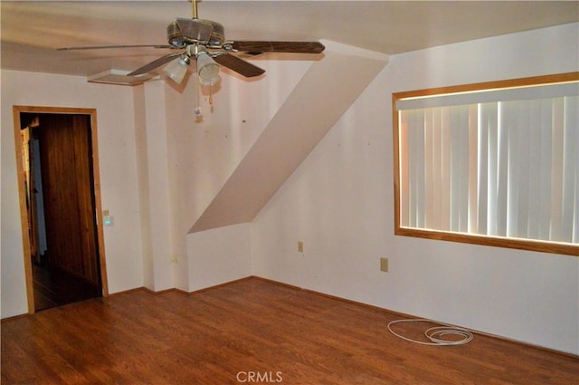 bonus room with hardwood / wood-style flooring and ceiling fan