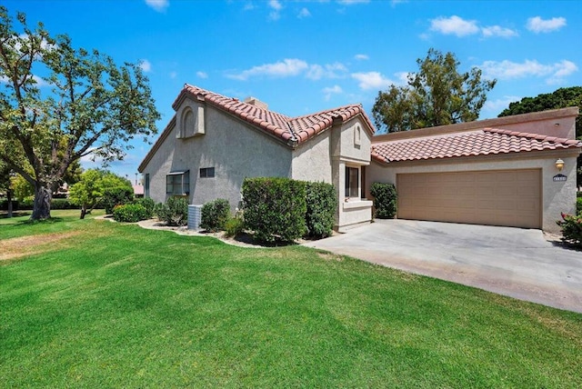 view of home's exterior with a garage and a lawn