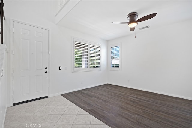 entrance foyer featuring light hardwood / wood-style floors and ceiling fan