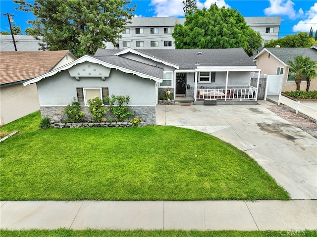 view of front of home with a front lawn