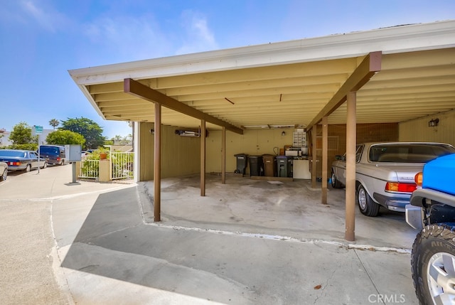 view of parking featuring a carport
