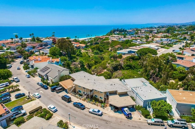bird's eye view featuring a water view and a residential view