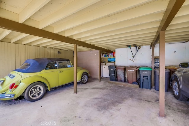 garage featuring independent washer and dryer