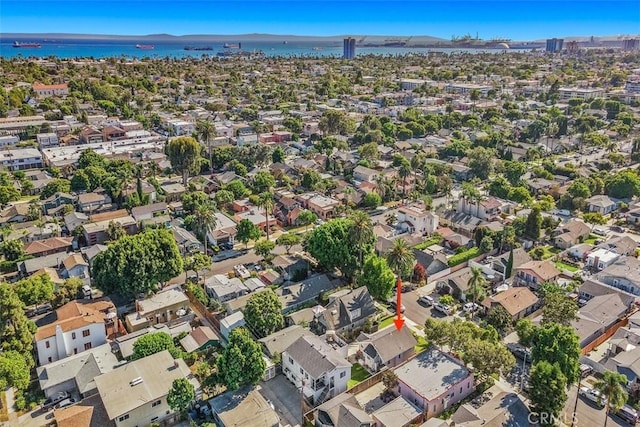 aerial view with a residential view and a water view