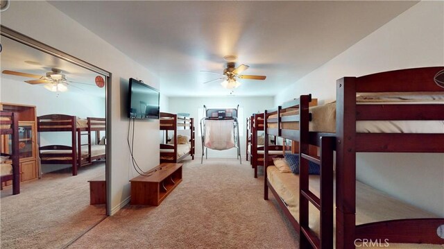 919 Venus Way, Crestline, CA 92325 - bedroom with baseboards and light colored carpet