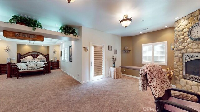 919 Venus Way, Crestline, CA 92325 - bedroom featuring a stone fireplace, recessed lighting, light colored carpet, visible vents, and baseboards