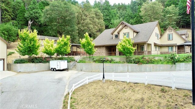 919 Venus Way, Crestline, CA 92325 - view of front of property with stone siding and fence