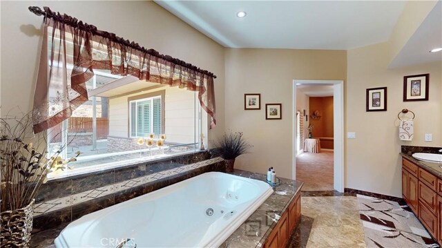 919 Venus Way, Crestline, CA 92325 - bathroom featuring recessed lighting, baseboards, vanity, and a tub with jets