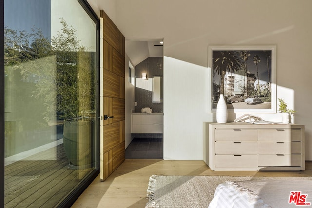 bathroom featuring vanity and hardwood / wood-style flooring