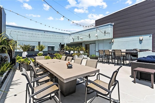 view of patio with an outdoor bar