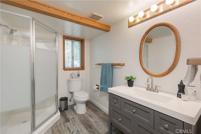 1154 Yukon Dr, Lake Arrowhead, CA 92352 - full bath featuring wood finished floors, a shower stall, toilet, and vanity