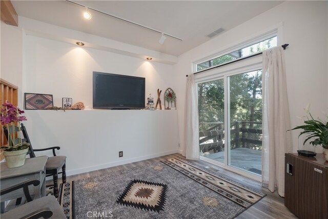 1154 Yukon Dr, Lake Arrowhead, CA 92352 - living room with rail lighting and wood finished floors