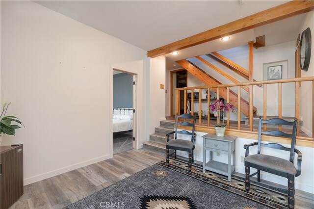 1154 Yukon Dr, Lake Arrowhead, CA 92352 - living room featuring wood finished floors, stairway, baseboards, beam ceiling, and recessed lighting