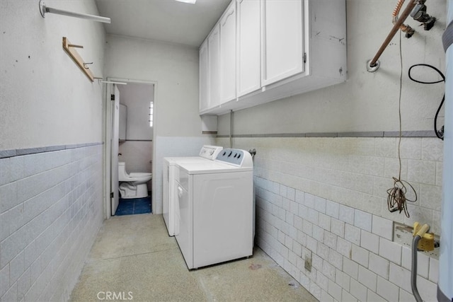 laundry room with washer and dryer