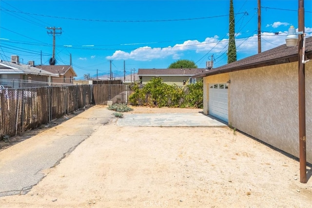 view of patio with a garage