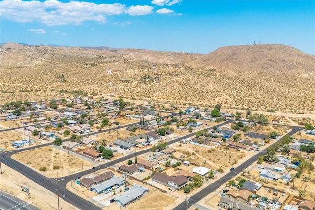 bird's eye view with a mountain view