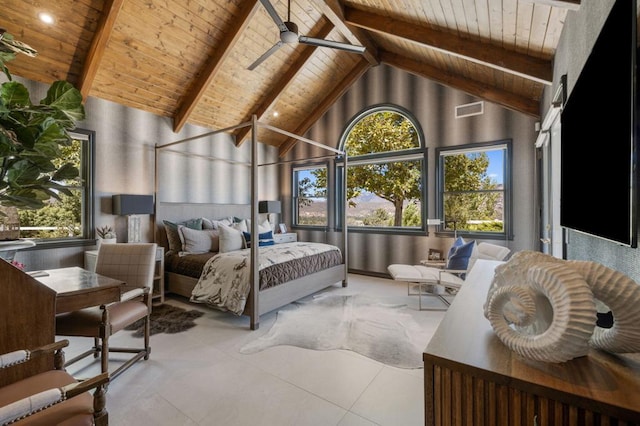 bedroom with ceiling fan, beam ceiling, multiple windows, and wooden ceiling