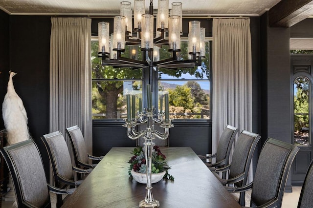 dining room with wooden ceiling and a wealth of natural light