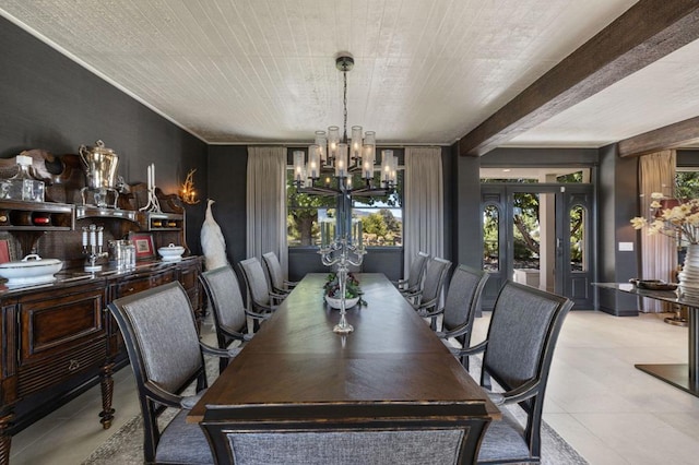 tiled dining room with a notable chandelier