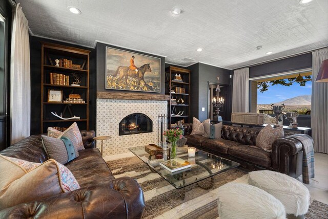 living room featuring a fireplace and built in features