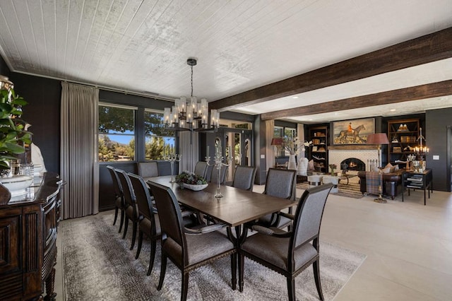 dining area featuring wooden ceiling and a notable chandelier