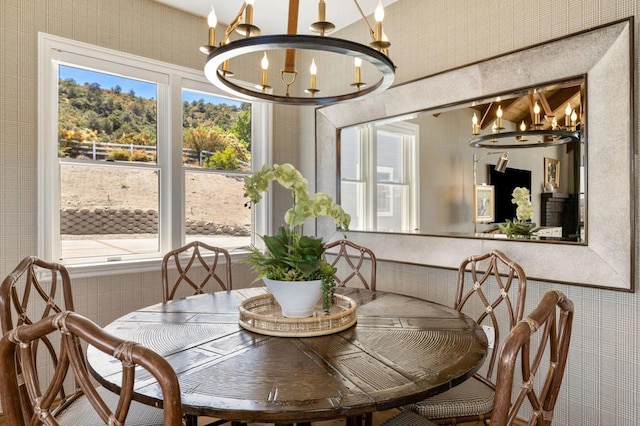 dining area featuring a chandelier