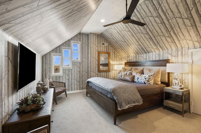 bedroom with ceiling fan, lofted ceiling, and light carpet