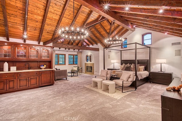 bedroom featuring high vaulted ceiling, a notable chandelier, wooden ceiling, light colored carpet, and beamed ceiling