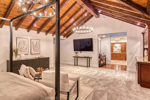 bedroom featuring baseboards, wood ceiling, and carpet