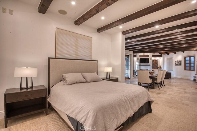 bedroom featuring recessed lighting, beamed ceiling, and baseboards