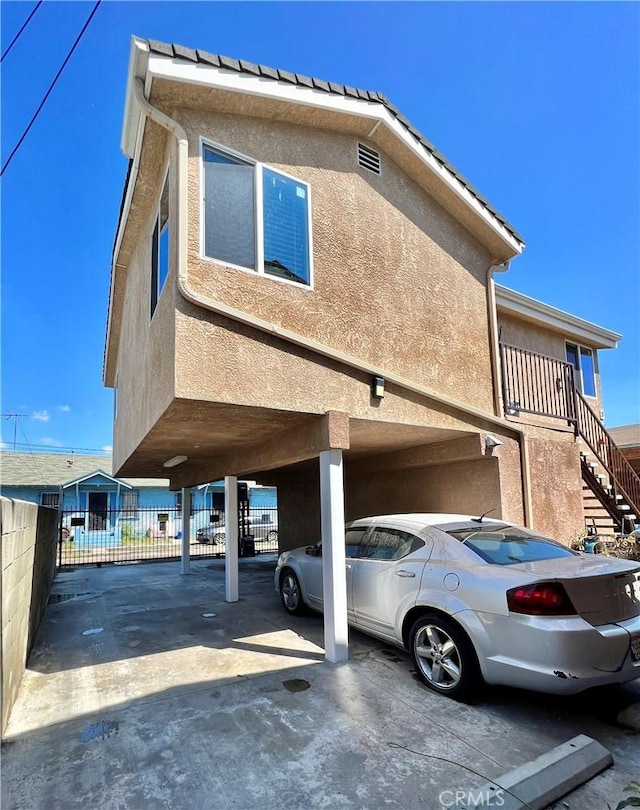 view of parking featuring a carport