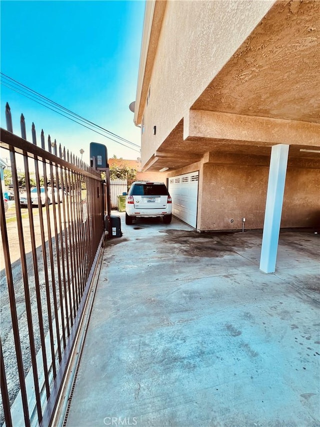 exterior space with a garage