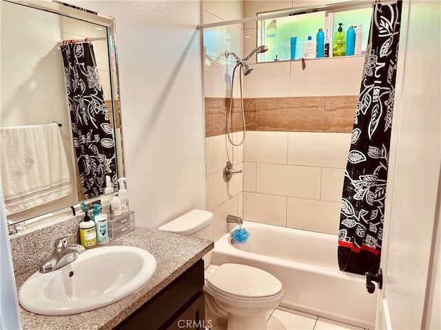 full bathroom featuring tile patterned flooring, shower / bath combo with shower curtain, toilet, and vanity