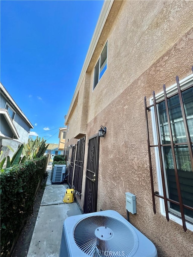 view of home's exterior featuring central AC