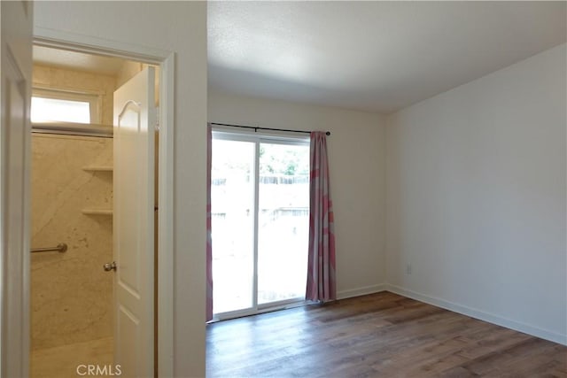 empty room featuring hardwood / wood-style floors