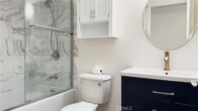 full bathroom with toilet, combined bath / shower with glass door, and vanity